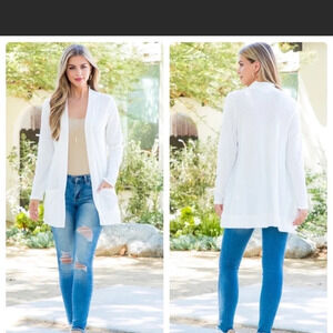You and Me(A Girl Thing). Cardigan Sweater. Ivory ribbed Cardigan. Pockets